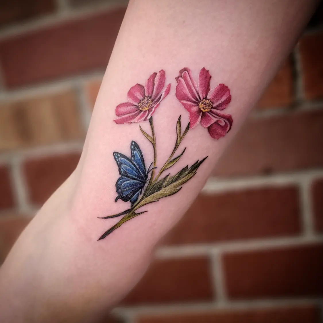 Flowers and butterfly realism tattoo on the forearm by Shar - Utah Tattoo Artist