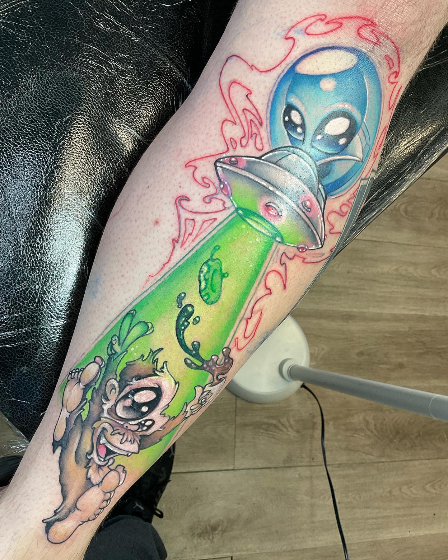 Alien and monkey new school tattoo on the forearm by Angell Tattoo Artist, Denver, Colorado