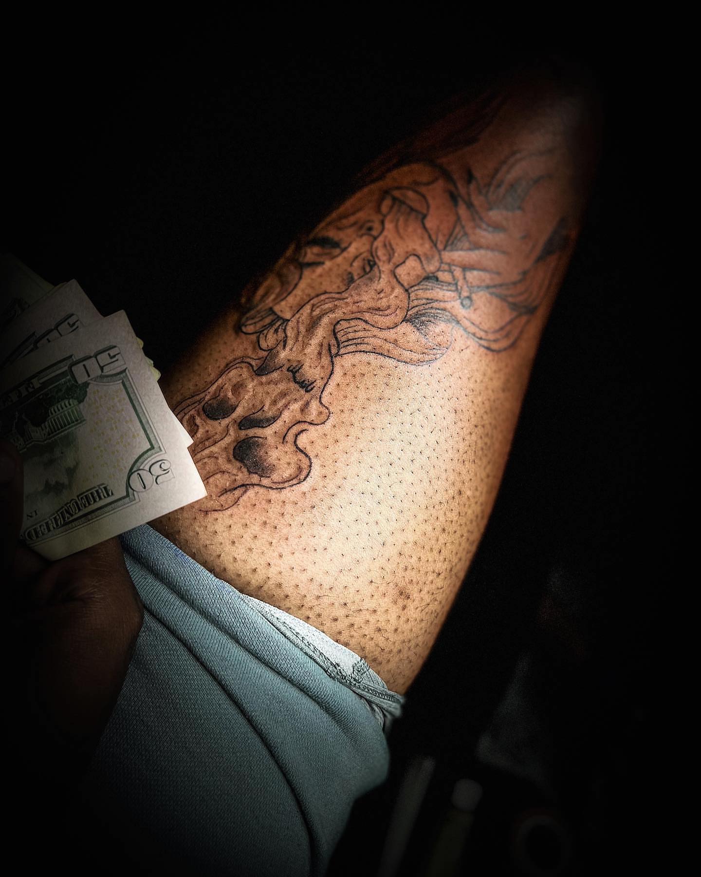 Abstract design dotwork tattoo on the upper arm by Traveling Tattoo Artist π