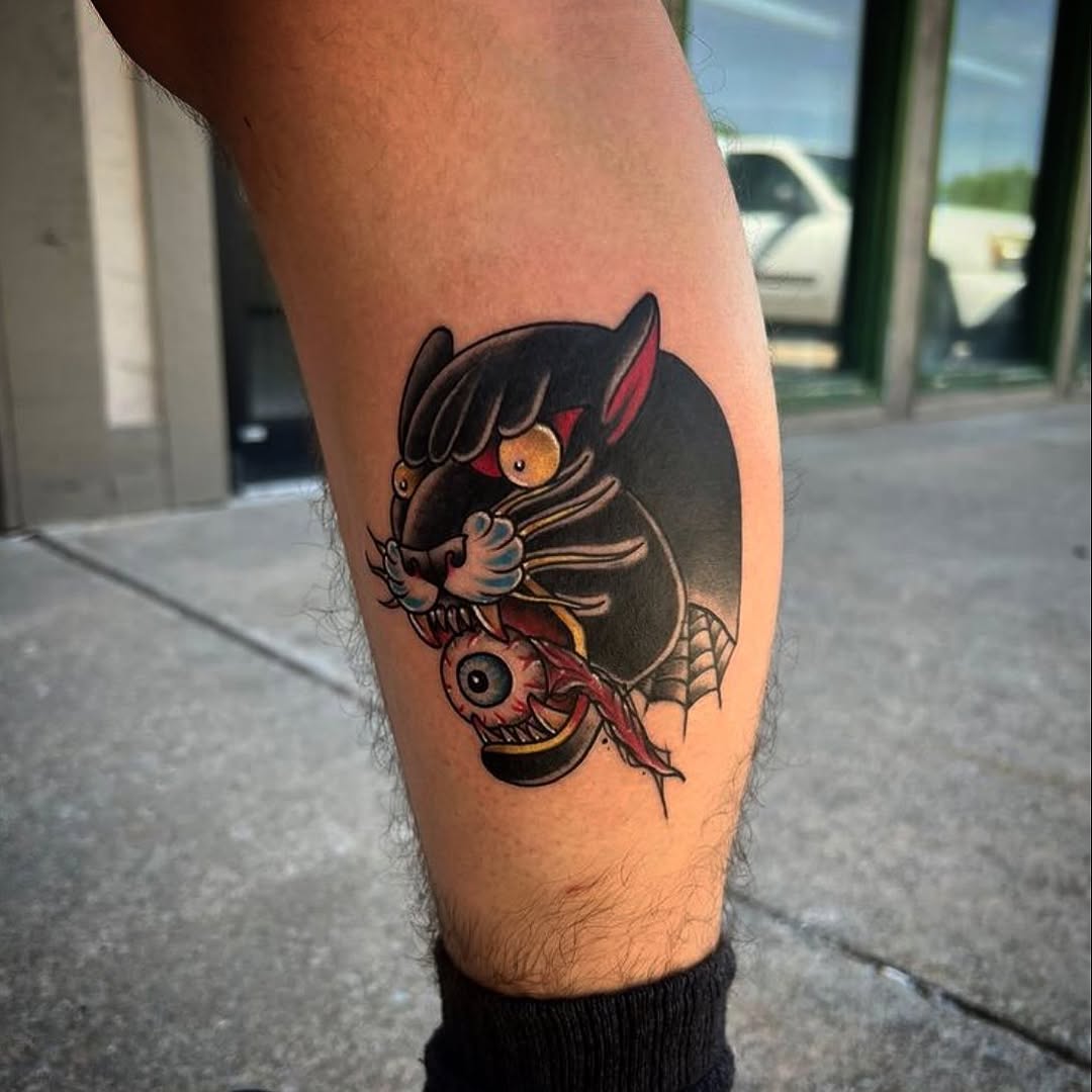 Panther head with eye realism tattoo on the forearm by Cody Wolfe