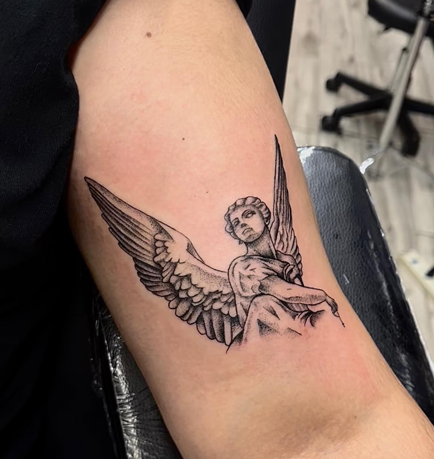Angel dotwork tattoo on the forearm by Monique Ortiz, Mesa, Arizona