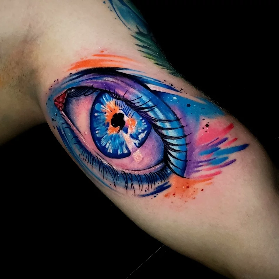 Eye watercolor tattoo on the forearm by Armando Carpio, Miami, Florida