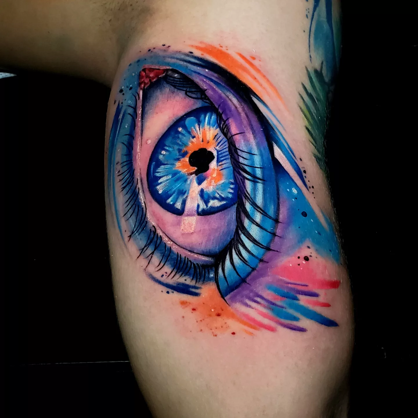 Eye watercolor tattoo on the forearm by Armando Carpio, Miami, Florida