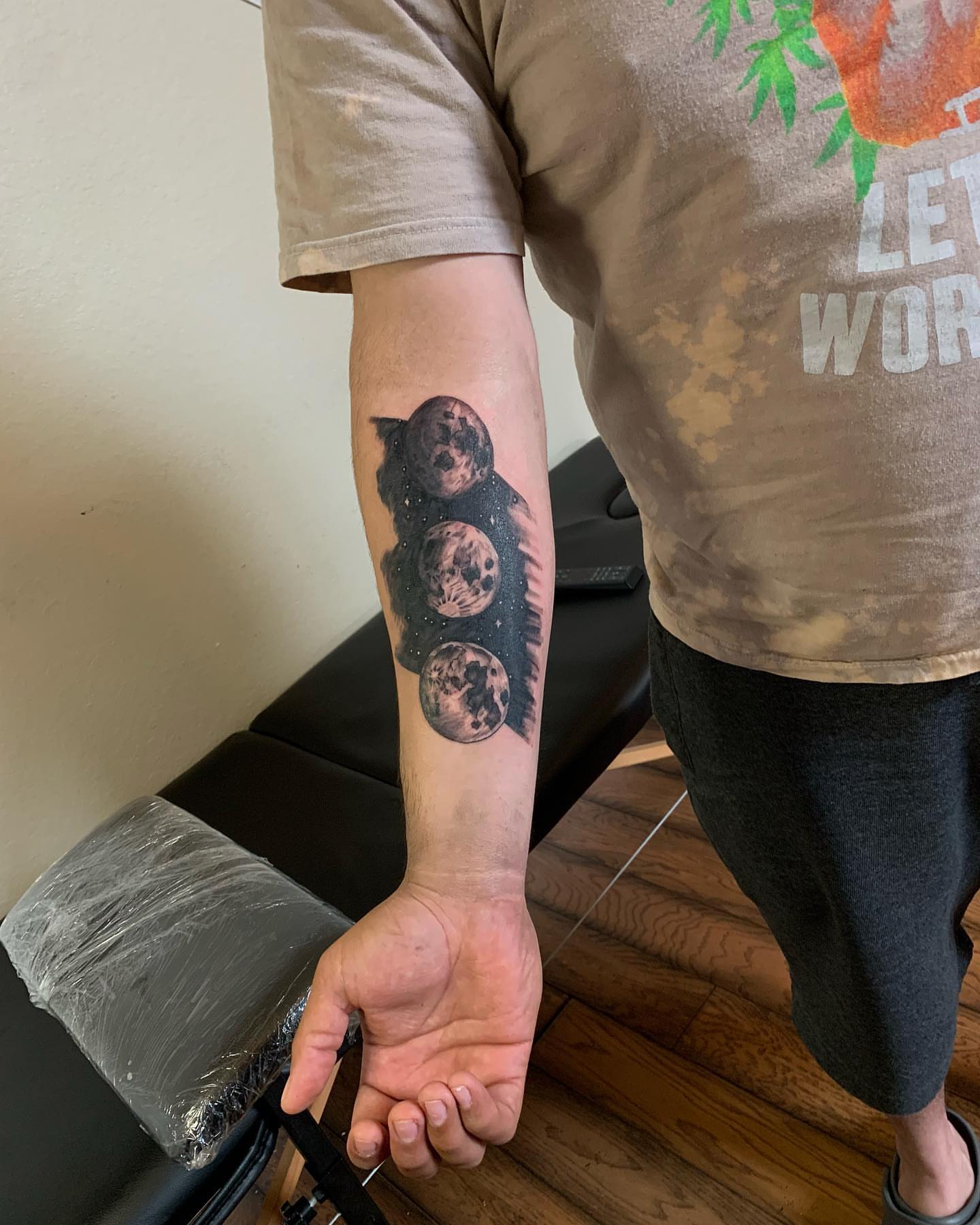 Planets dotwork tattoo on the forearm by Leo Torres