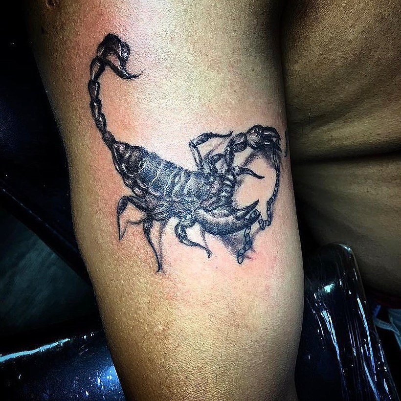 Scorpion black and grey tattoo on the leg by Visionary Tattoos