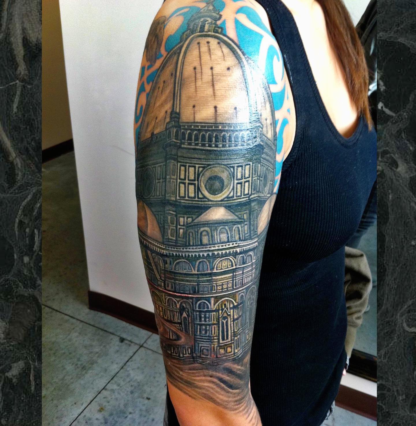 Duomo cathedral realism tattoo on the forearm by Patrick Delvar