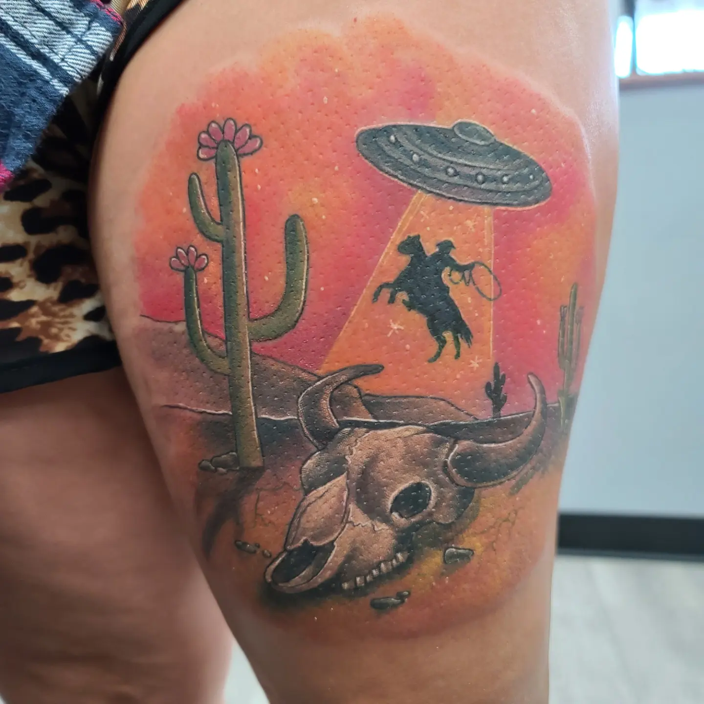 Desert landscape realism tattoo on the thigh by Elidia Veliz