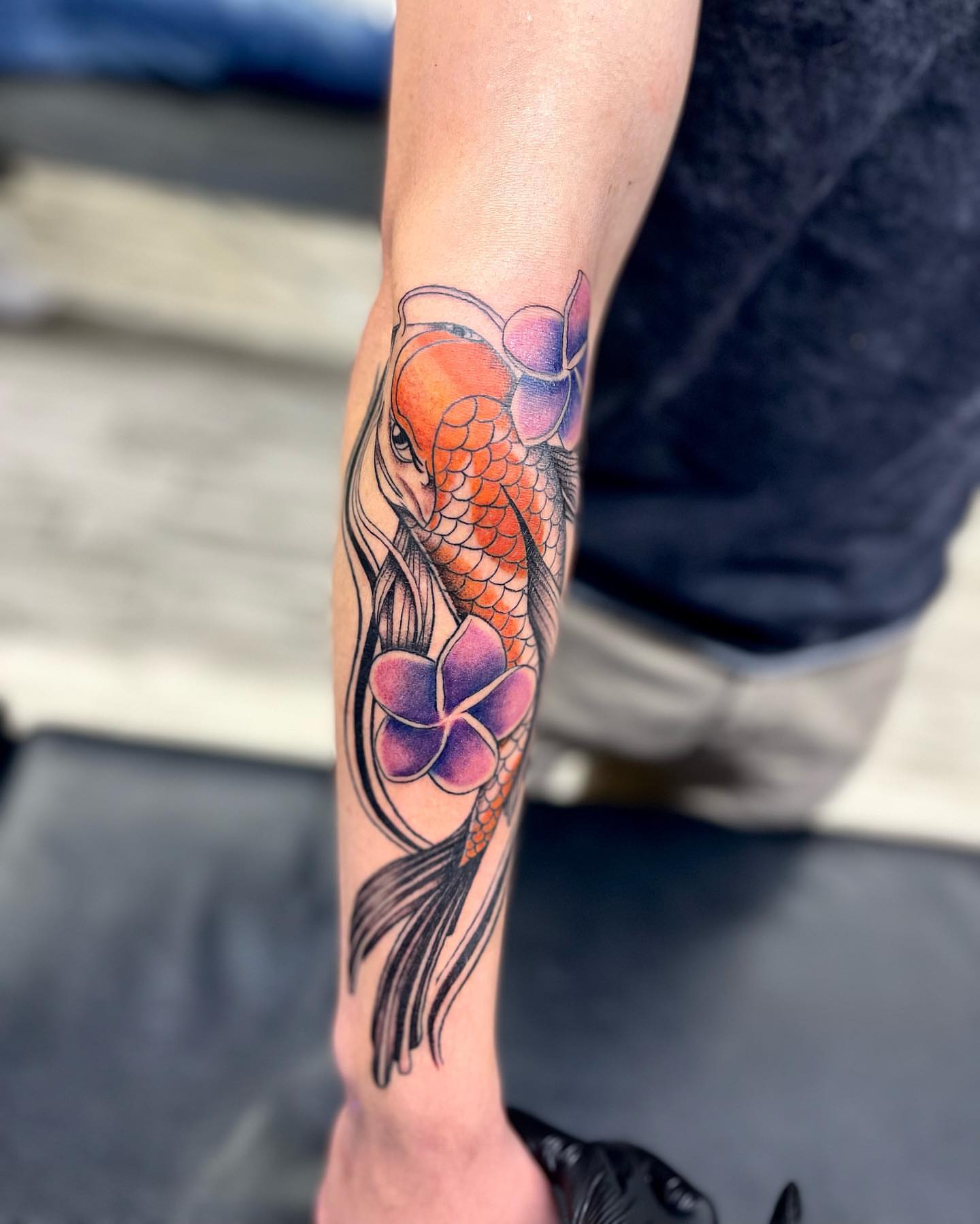 Koi fish and flowers japanese irezumi tattoo on the forearm by Monique Ortiz, Mesa, Arizona