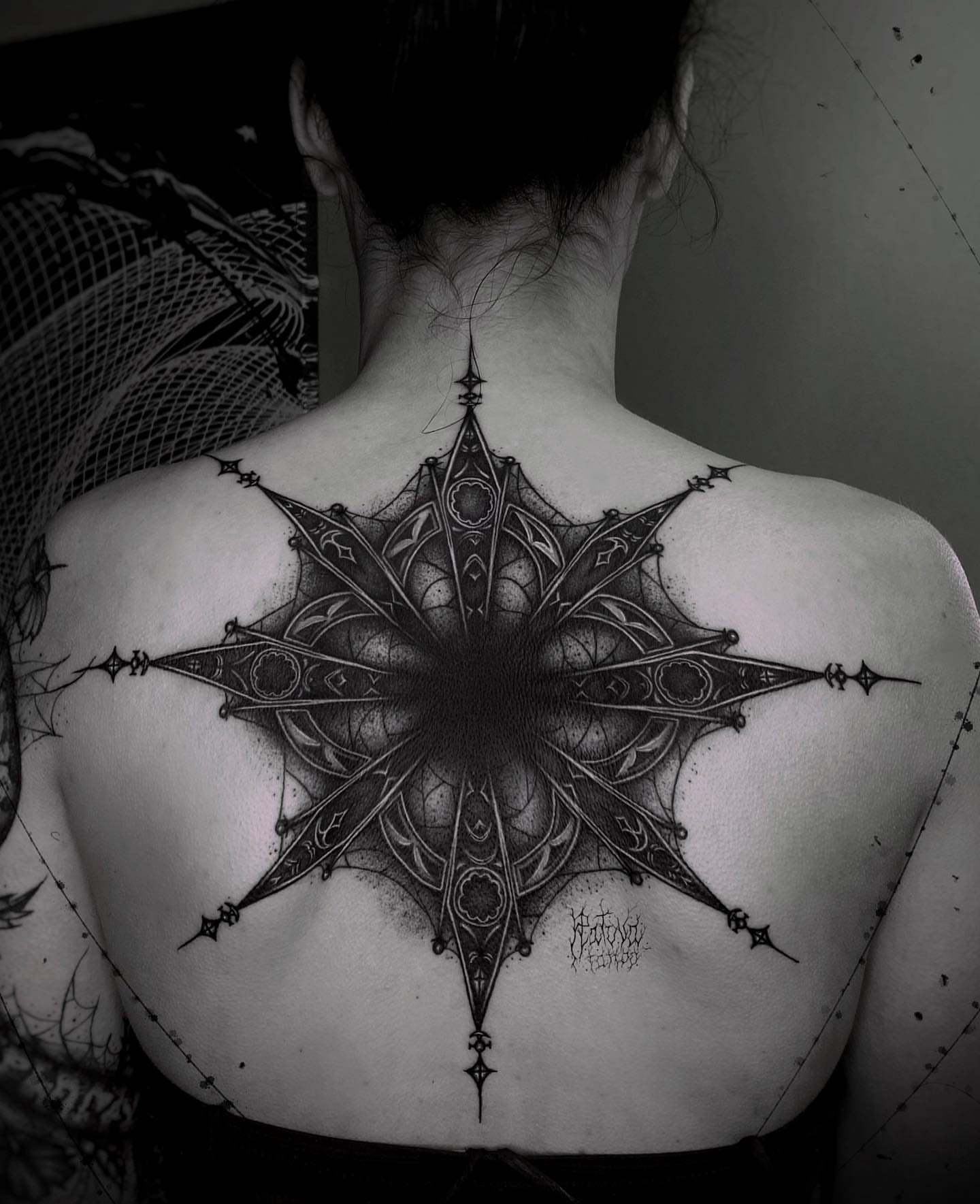 Geometric mandala geometric tattoo on the back by Dark Gothic Tattoo