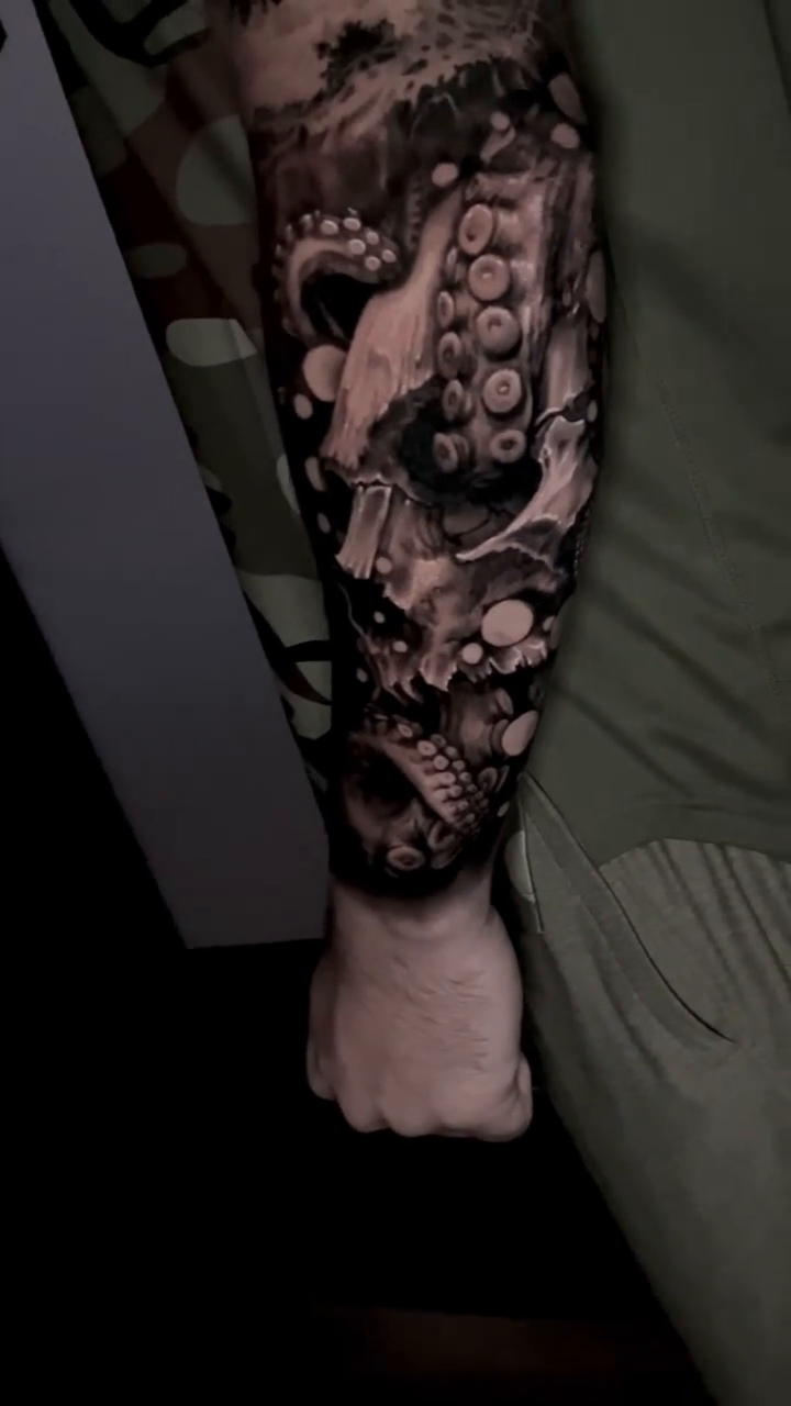 Octopus and skull sleeve dark realism tattoo by Sean Flood