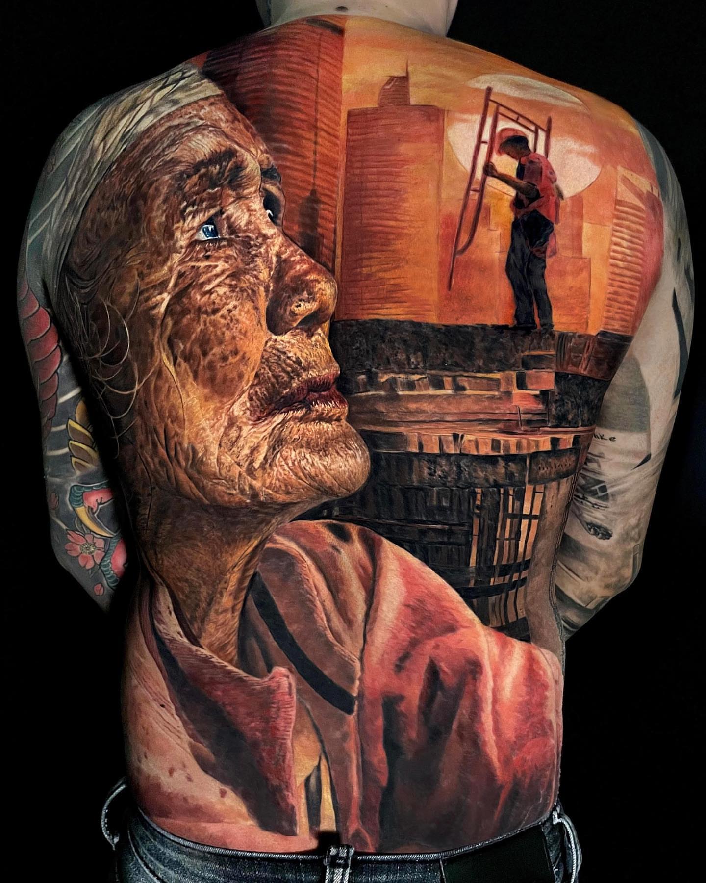Elderly man realism tattoo on the back by Bình Nguyễn