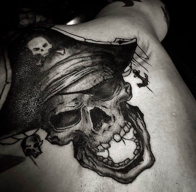 Skull realism tattoo on the shoulder by Visionary Tattoos