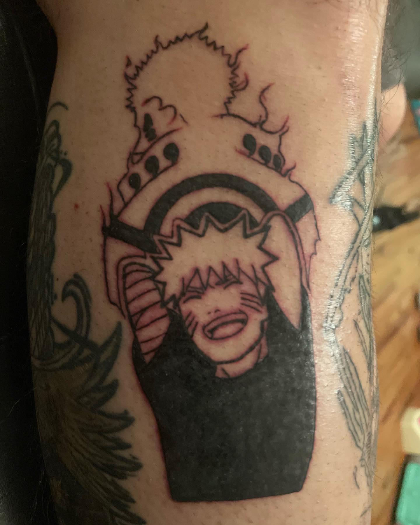 Anime character anime tattoo on the forearm by Christhian King