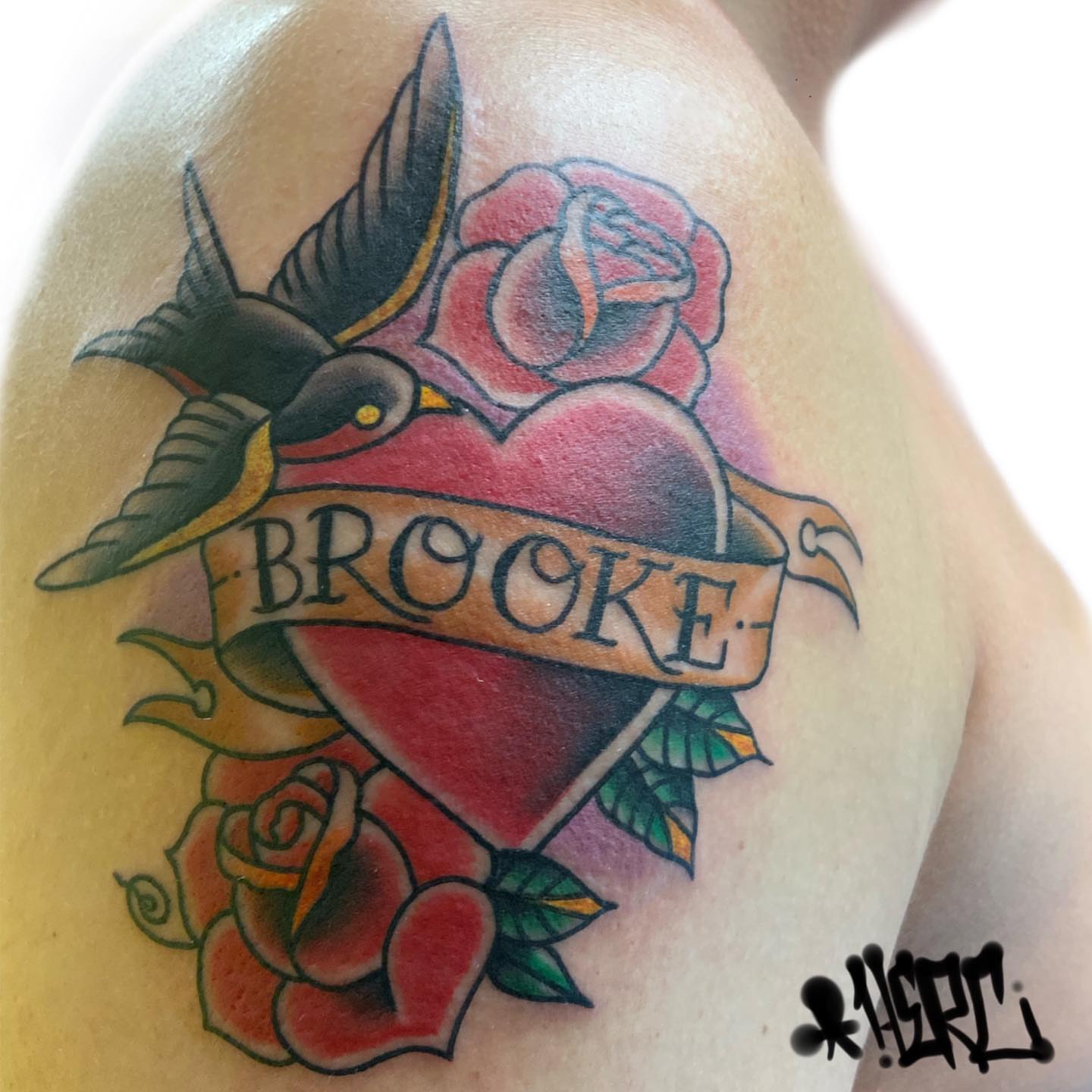 Heart with name American traditional tattoo on the shoulder by Herc