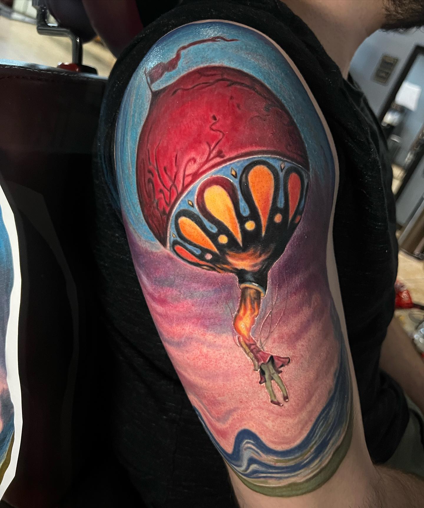 Hot air balloon realism tattoo on the forearm by Gary Graves