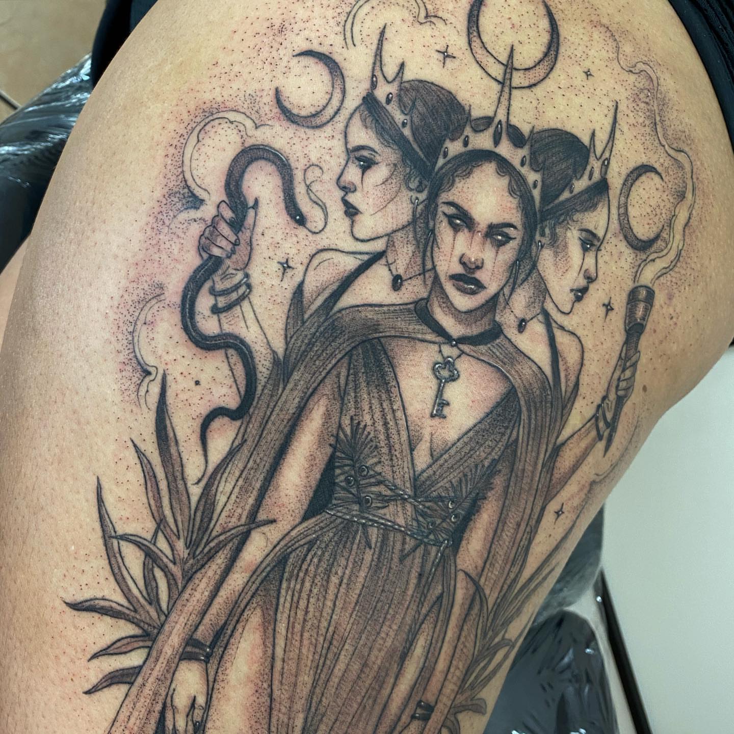 Three queens dotwork tattoo on the thigh by Marissa Tattoos