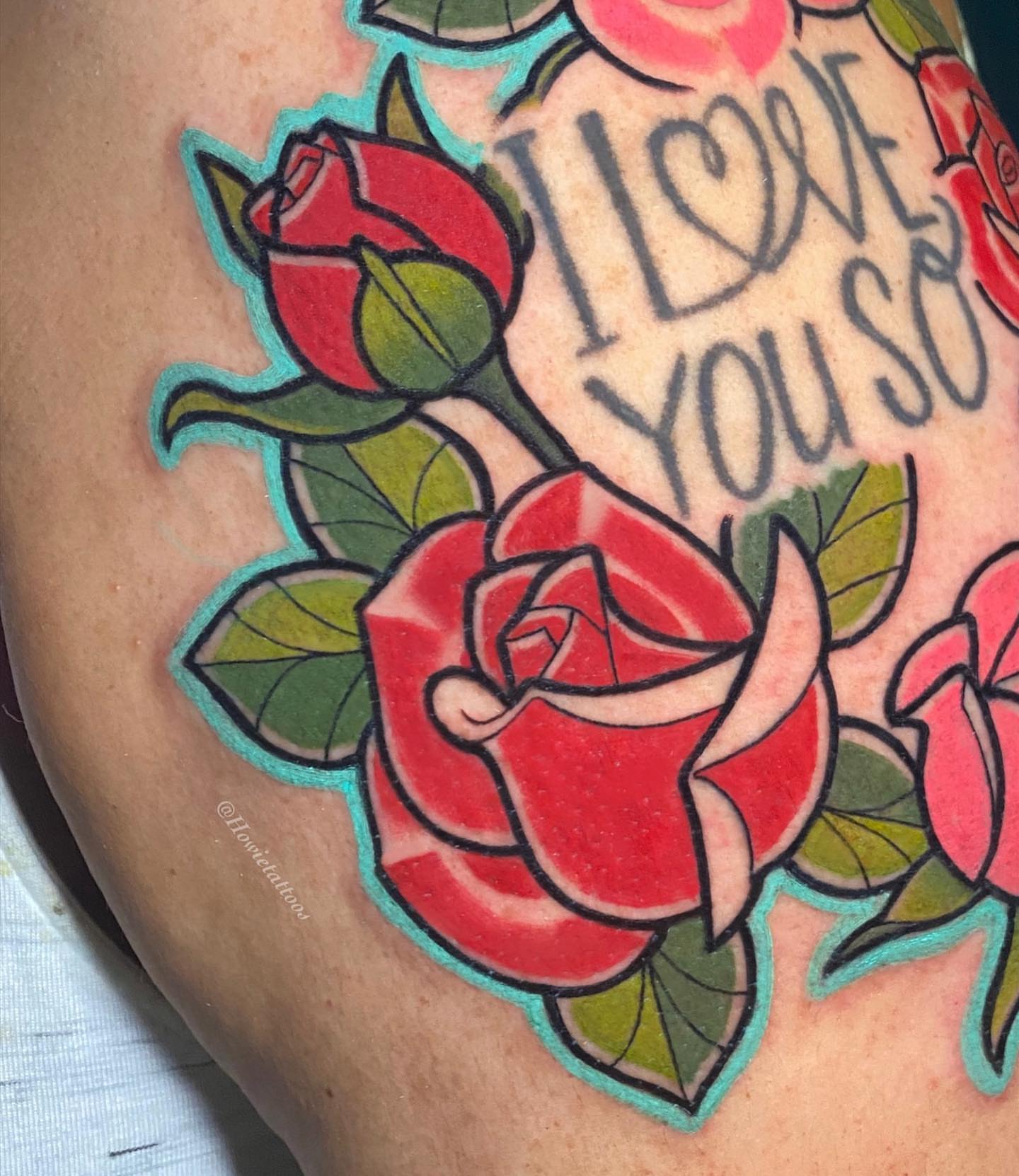 Red roses American traditional tattoo on the thigh by Brian Horowitz