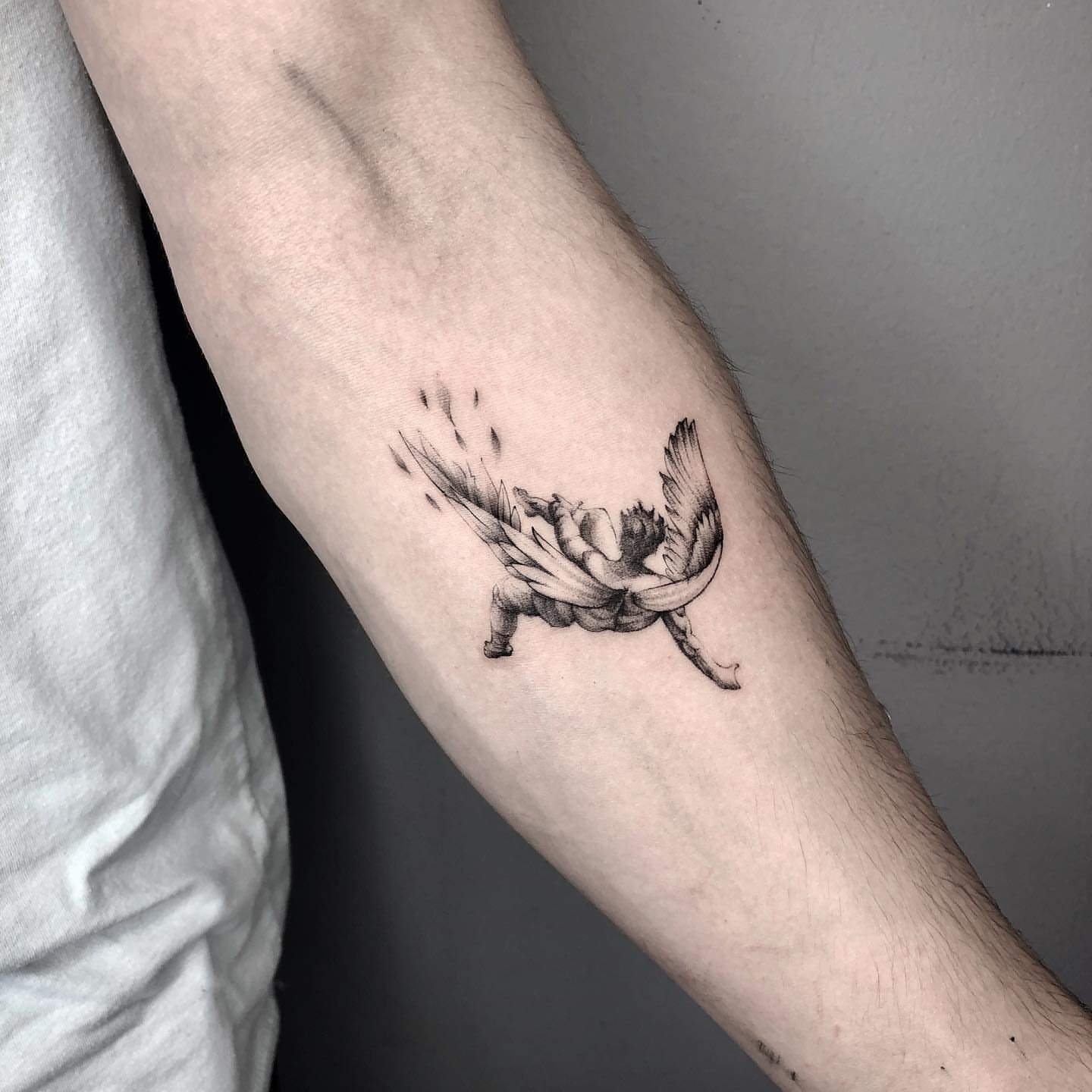 Bird black and grey tattoo on the forearm by Shihao zhao