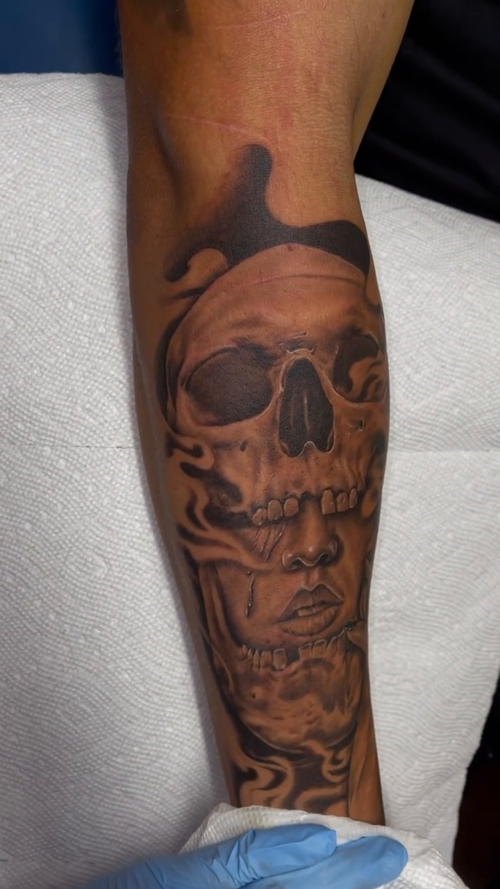 Skull and face realism tattoo by Bruno Guerrero
