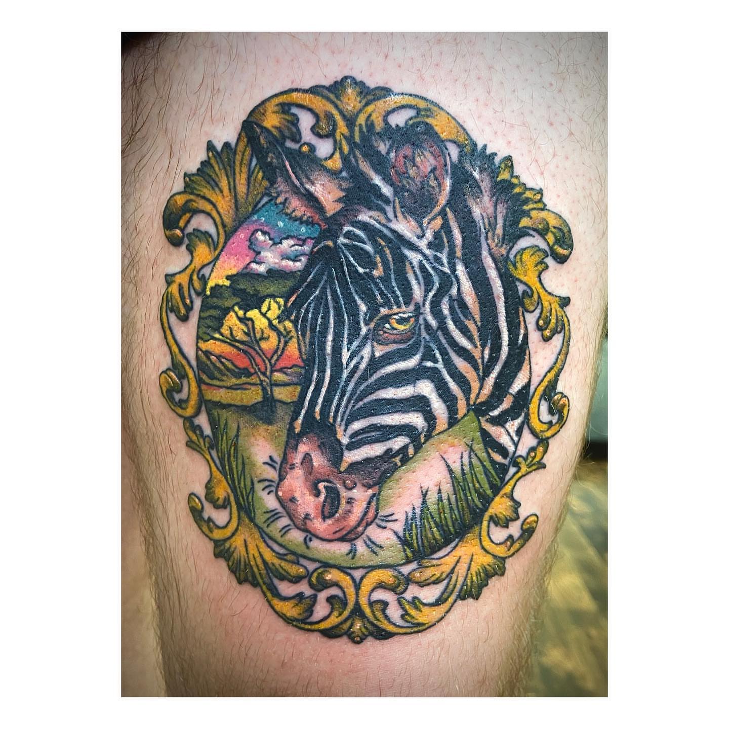Zebra realism tattoo on the thigh by Luna