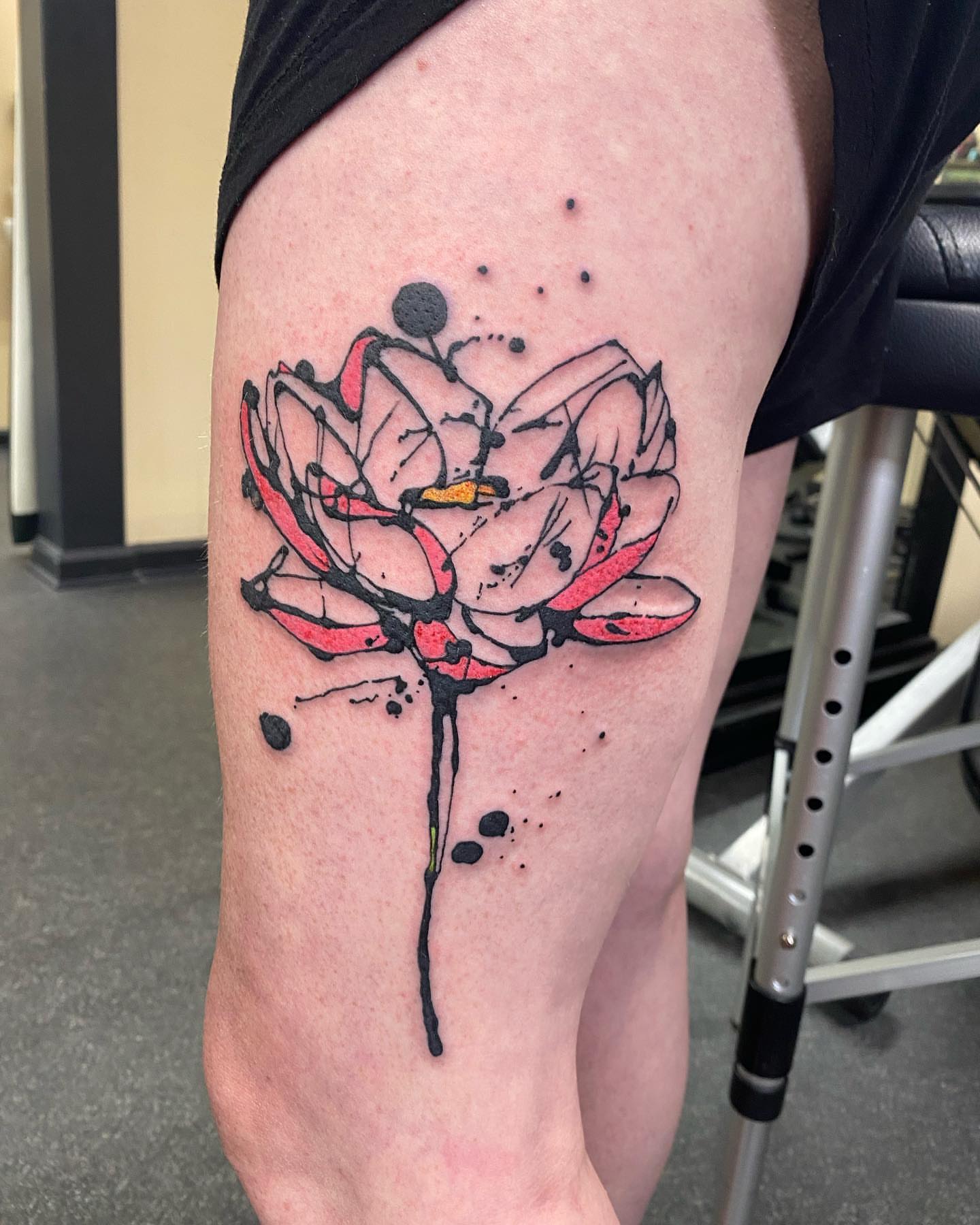 Lotus flower dotwork tattoo on the thigh by Keith Cromie