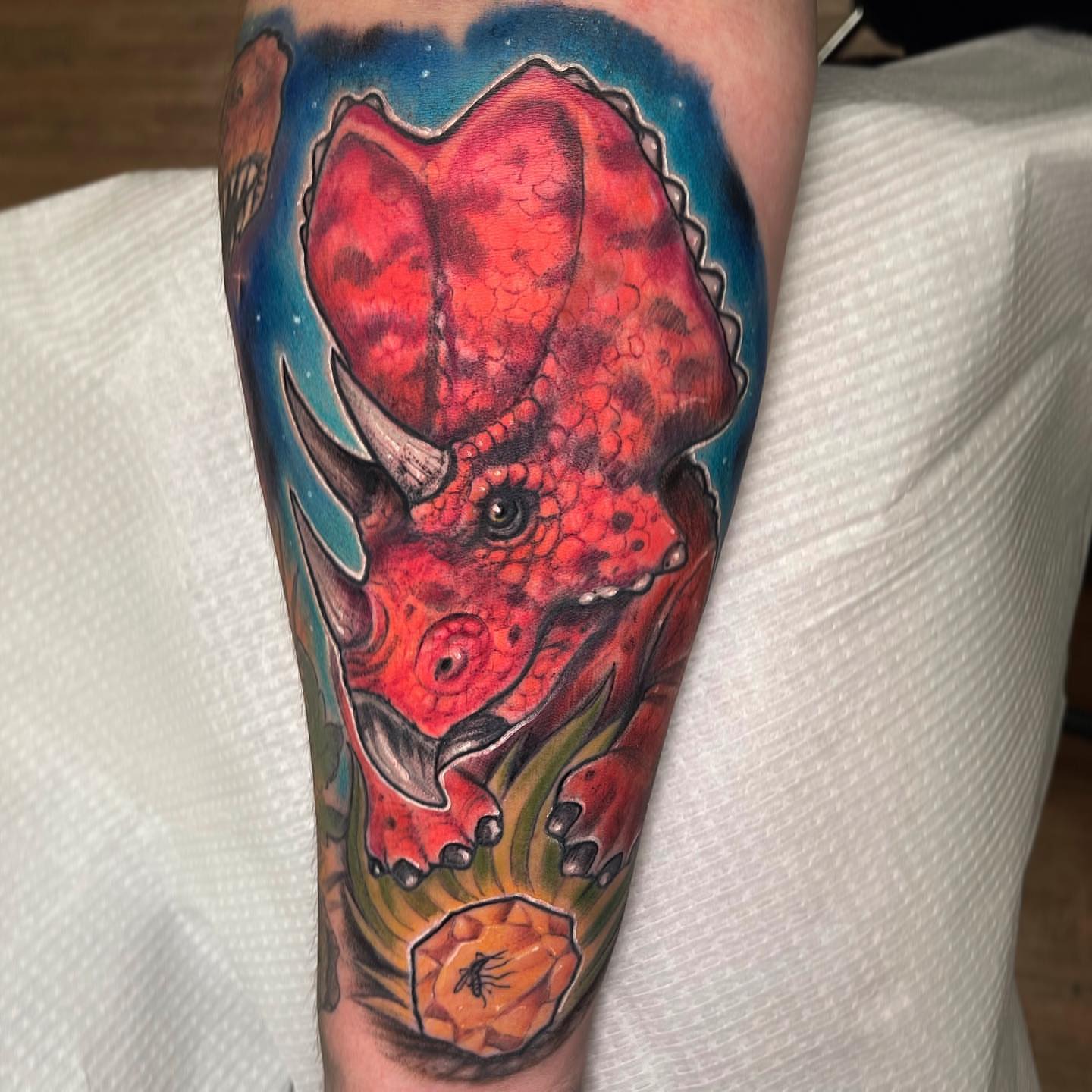Triceratops realism tattoo on the forearm by Greg West Sac tattoo artist, West Sacramento, California
