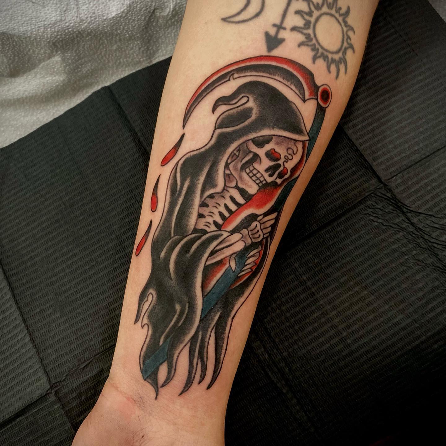 Grim reaper American traditional tattoo on the forearm by Daniel Gutierrez
