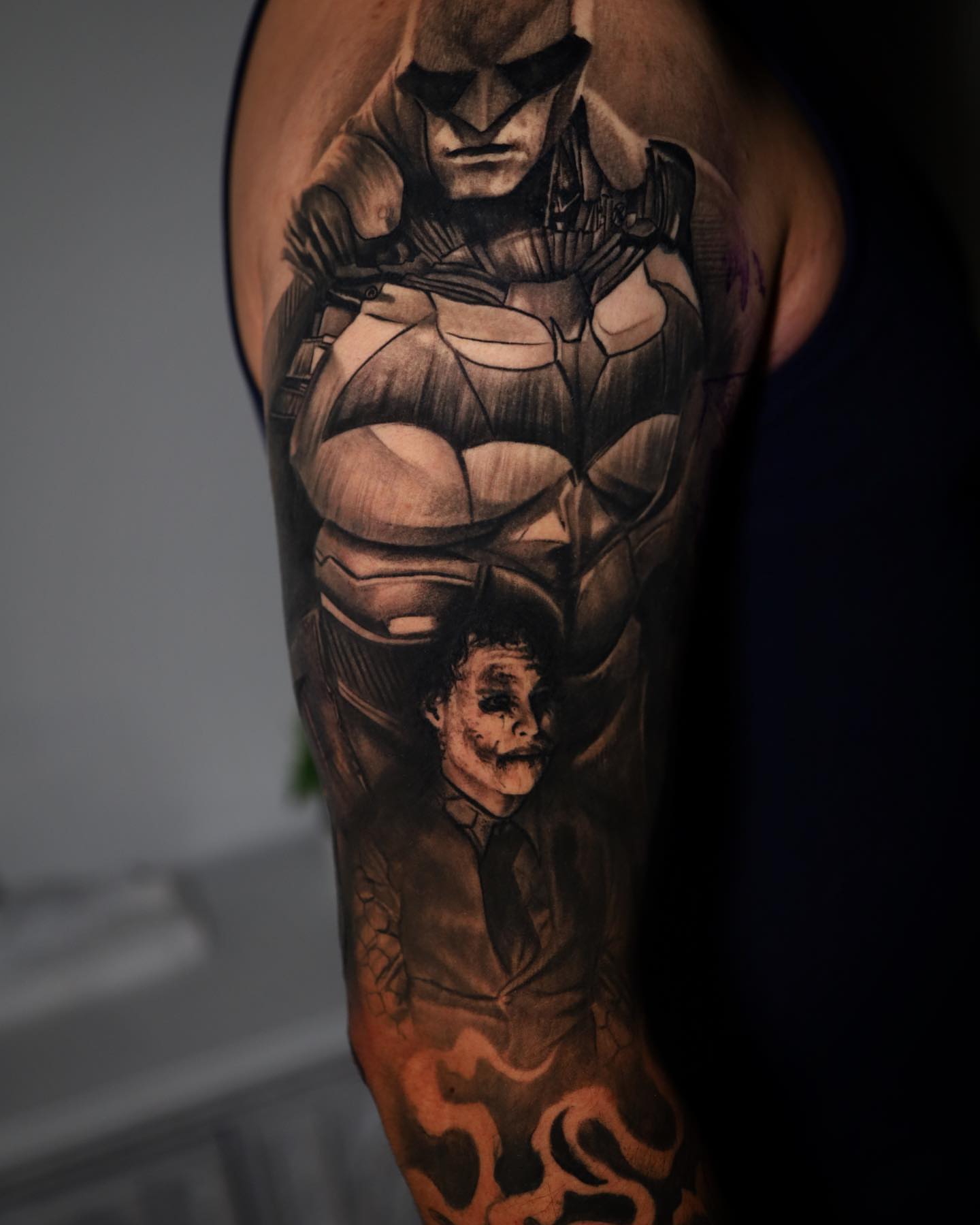 Batman and joker realism tattoo on the forearm by Gabriel Varelas, Phoenix, Arizona