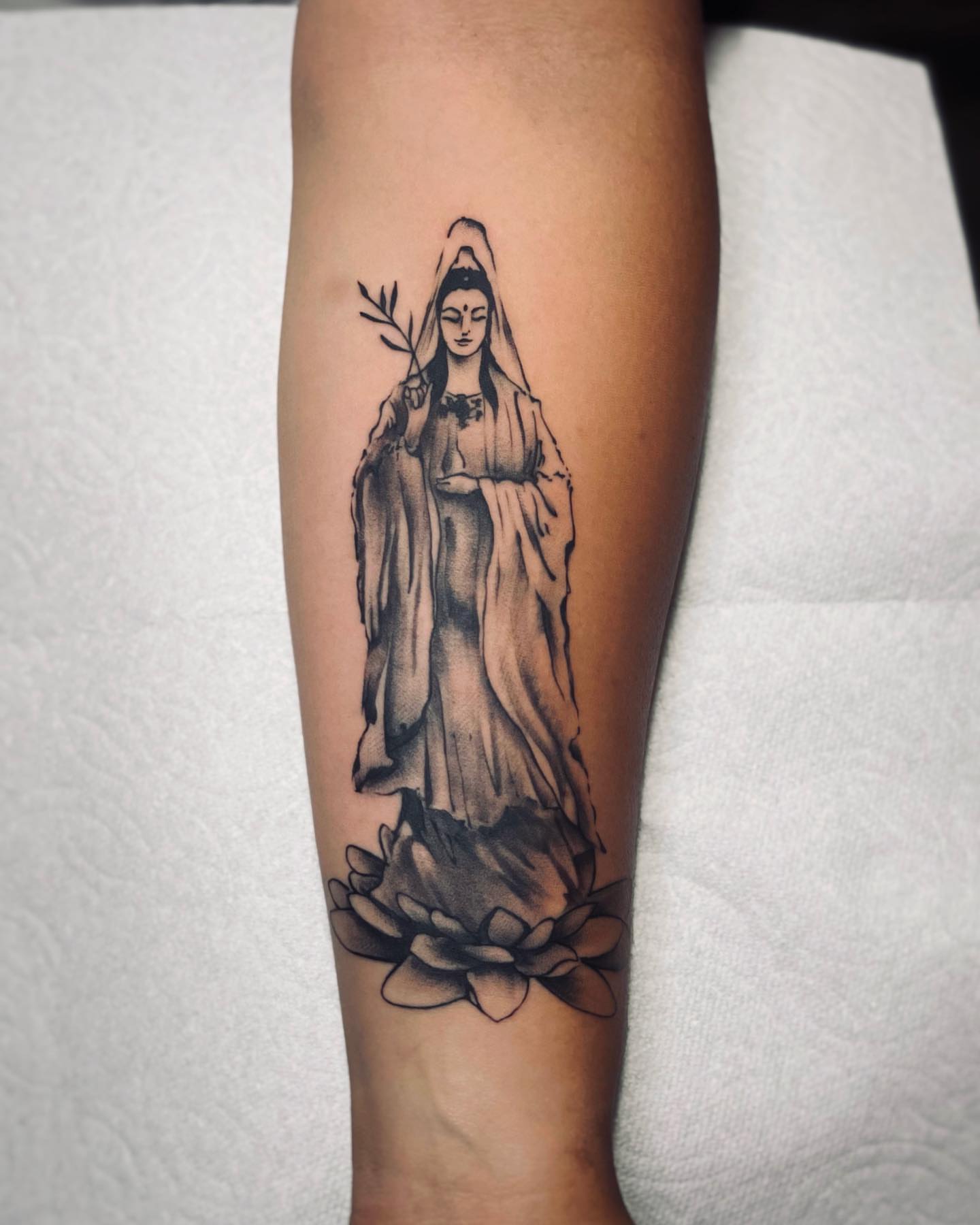 Guanyin black and grey tattoo on the forearm by Alice Li, Houston, Texas
