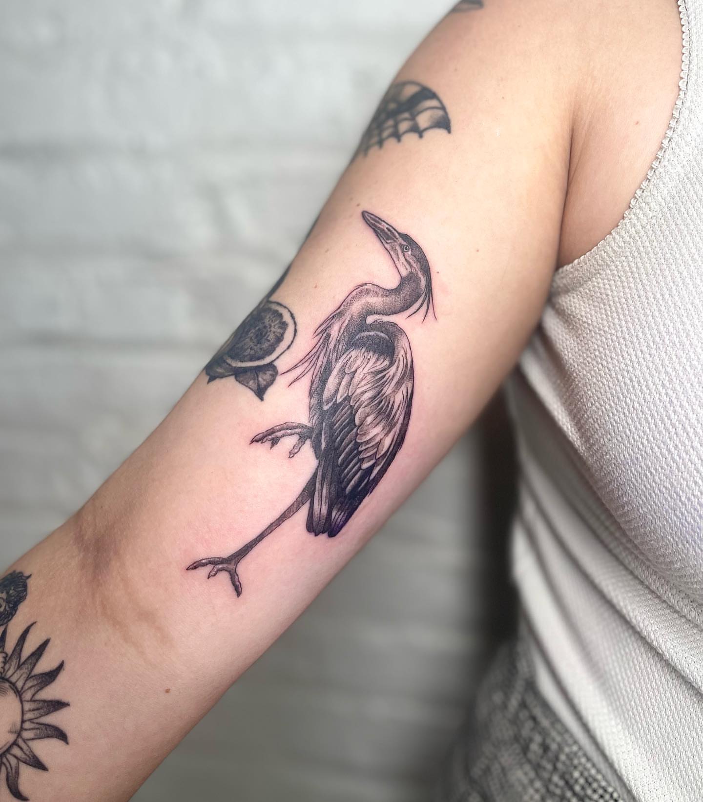 Heron black and grey tattoo on the forearm by 𓆏 Alyssa Carbonara 𓆏