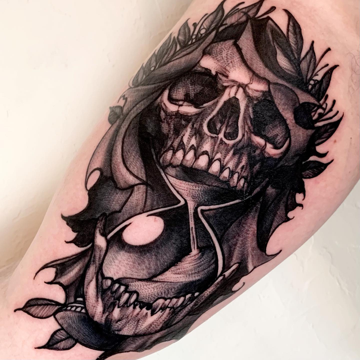Skull with leaves realism tattoo on the forearm by ⚔ Dylan Smith ⚔, Richmond, Virginia