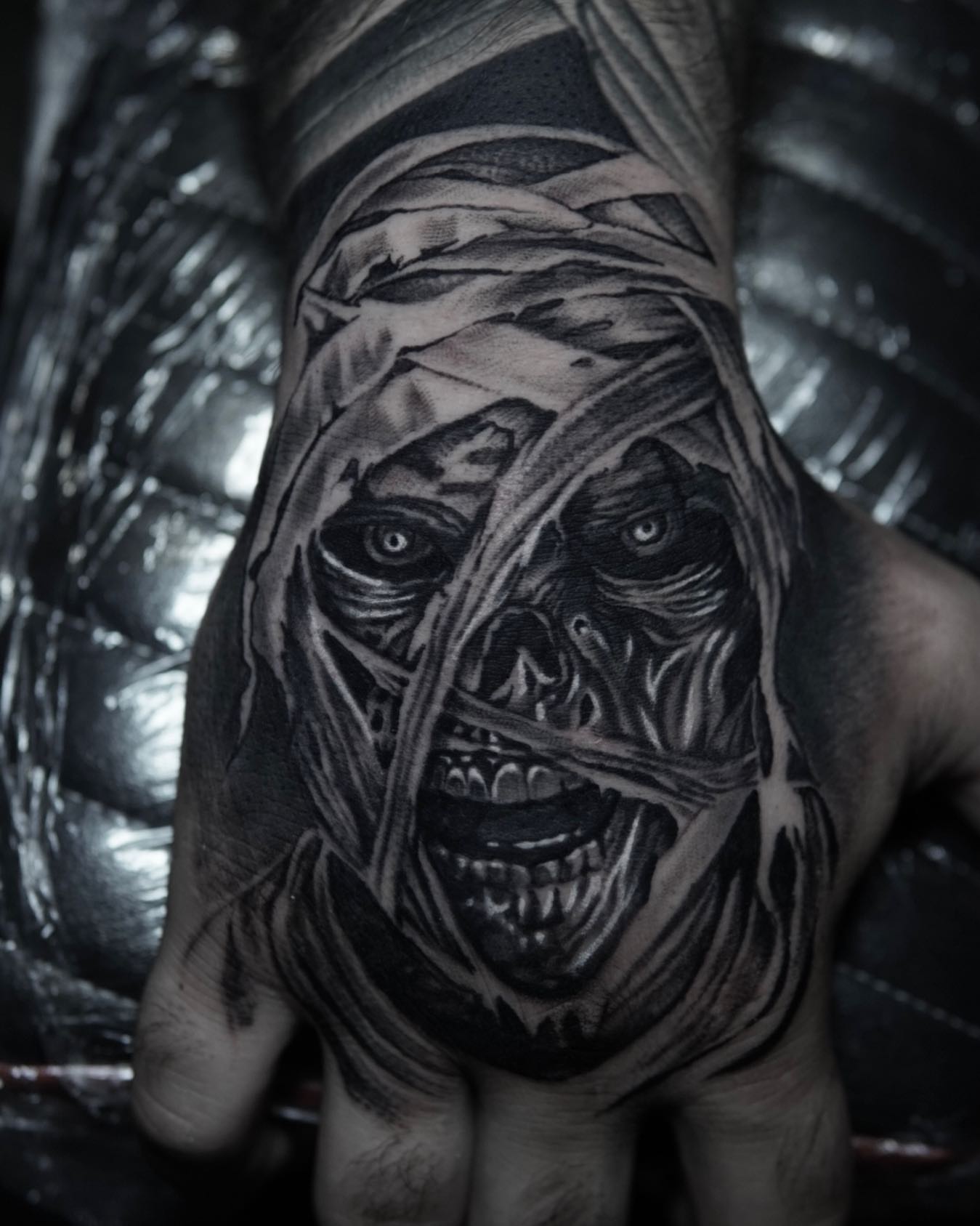 Mummy realism tattoo on the hand by Brian Cassidy