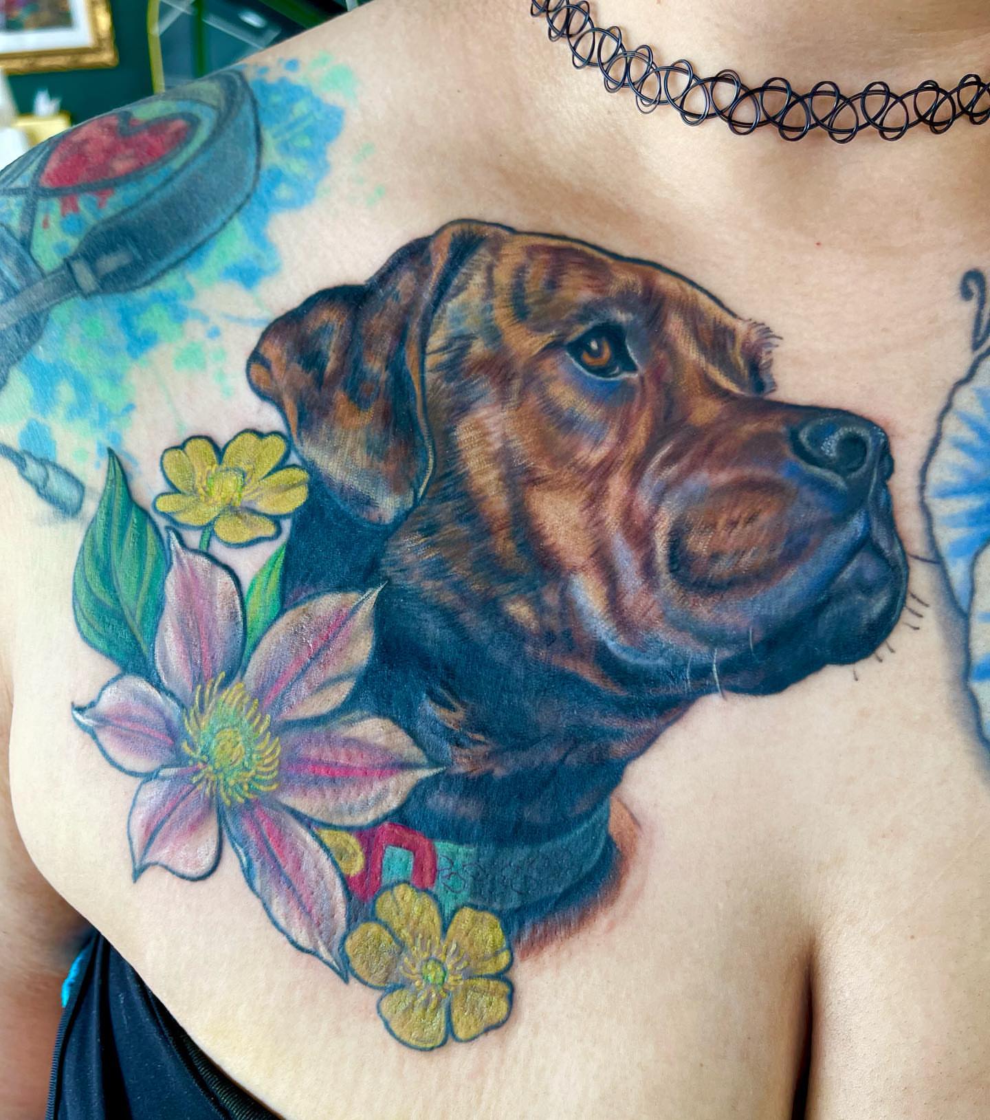 Dog portrait realism tattoo on the chest by Chelsea Youngblood, Seattle, Washington