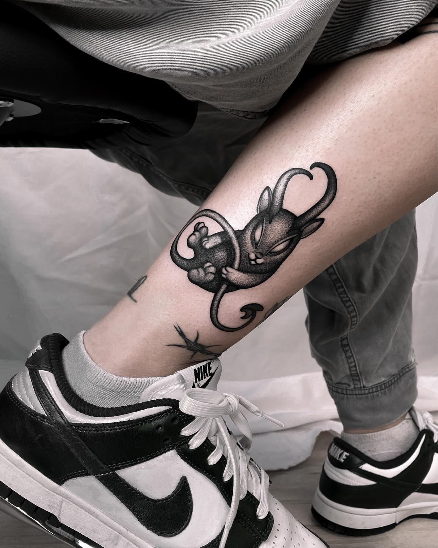 Tattoo by @kairo.tattooer — black_and_grey