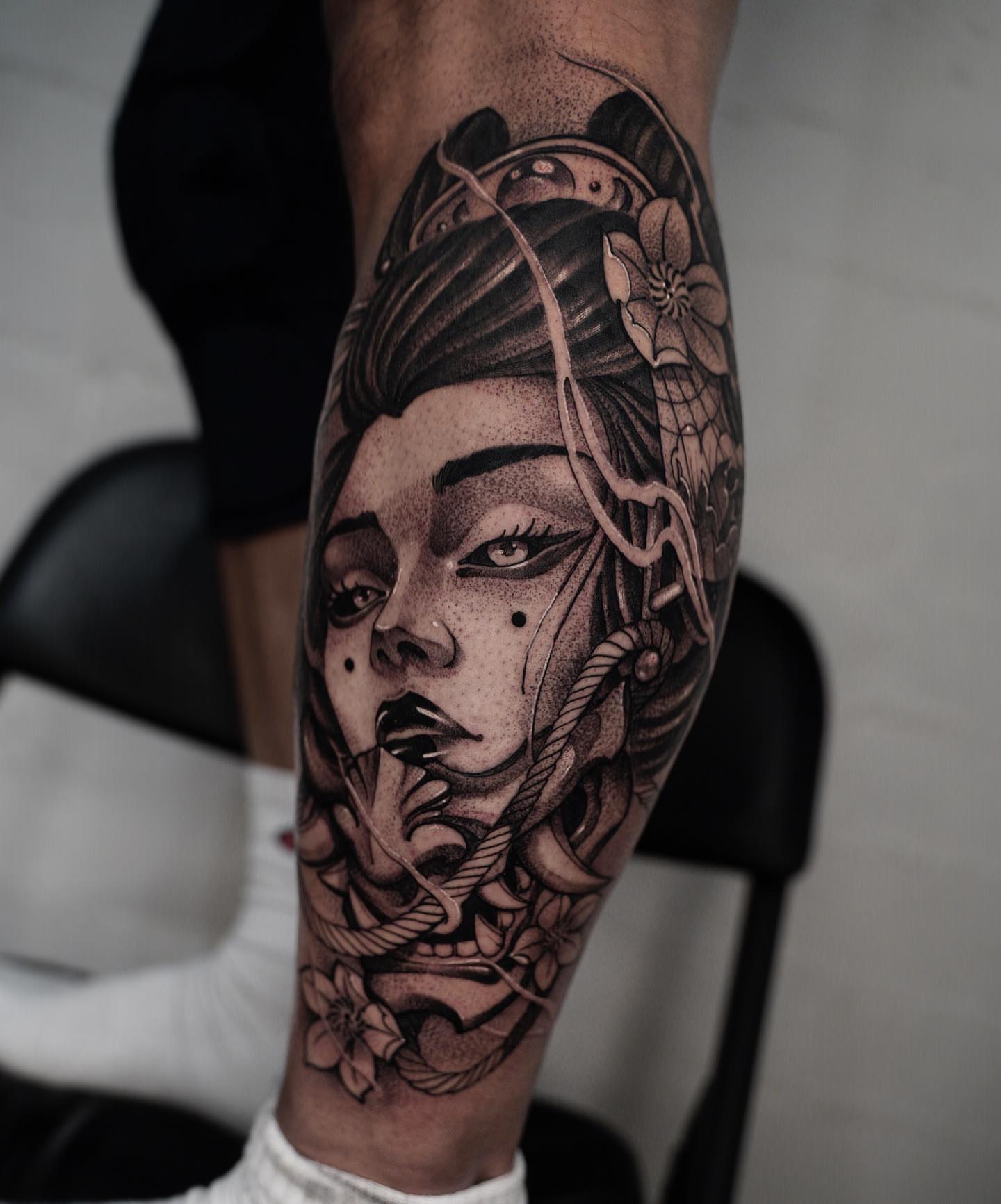 Woman's face dotwork tattoo on the forearm by Manuel Alejandro Maldonado