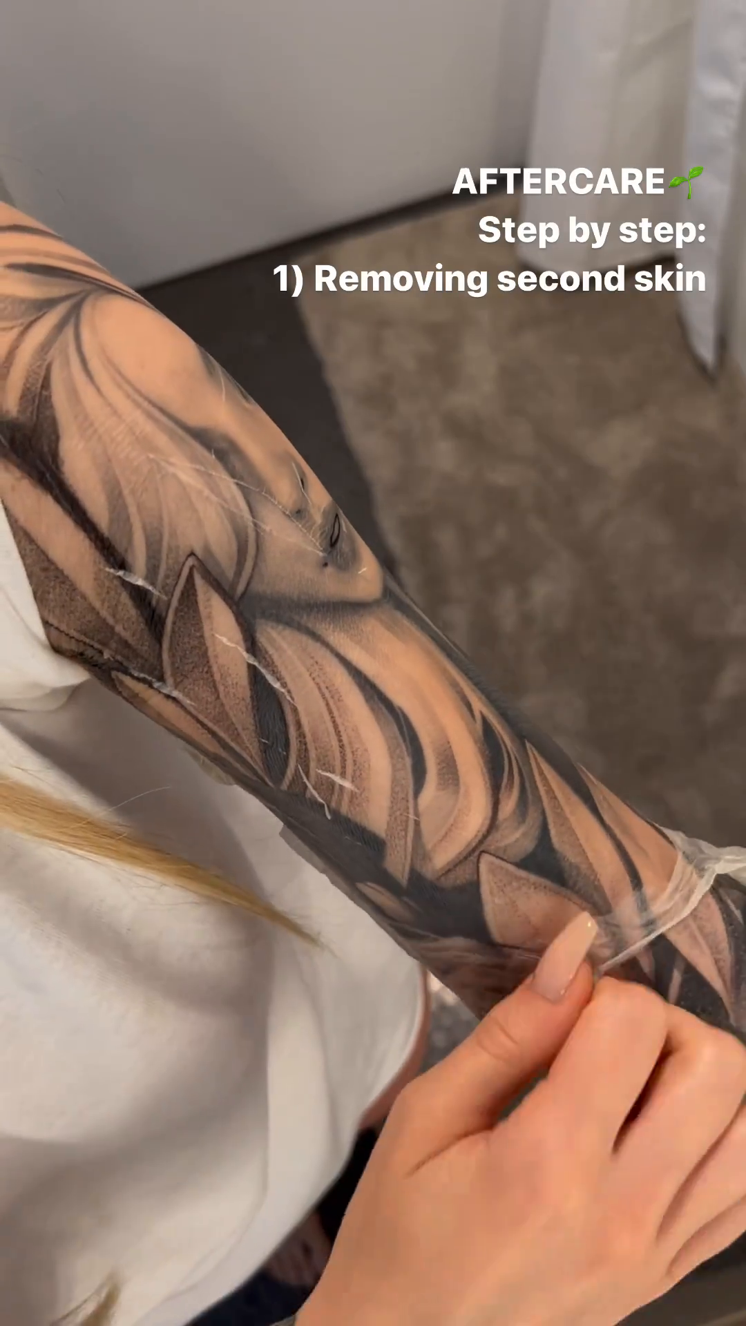Woman's face and floral elements realism tattoo by Anna Chernova, San Francisco, California