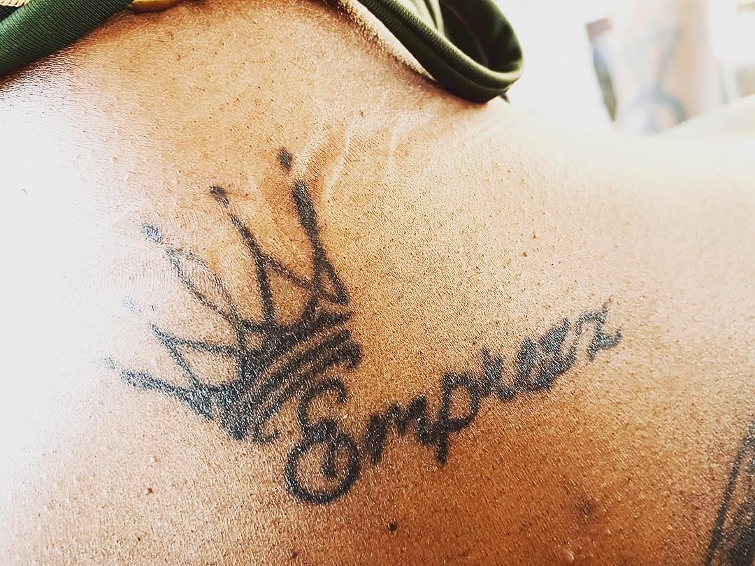 Crown with the word Empress lettering tattoo on the shoulder by Danimals