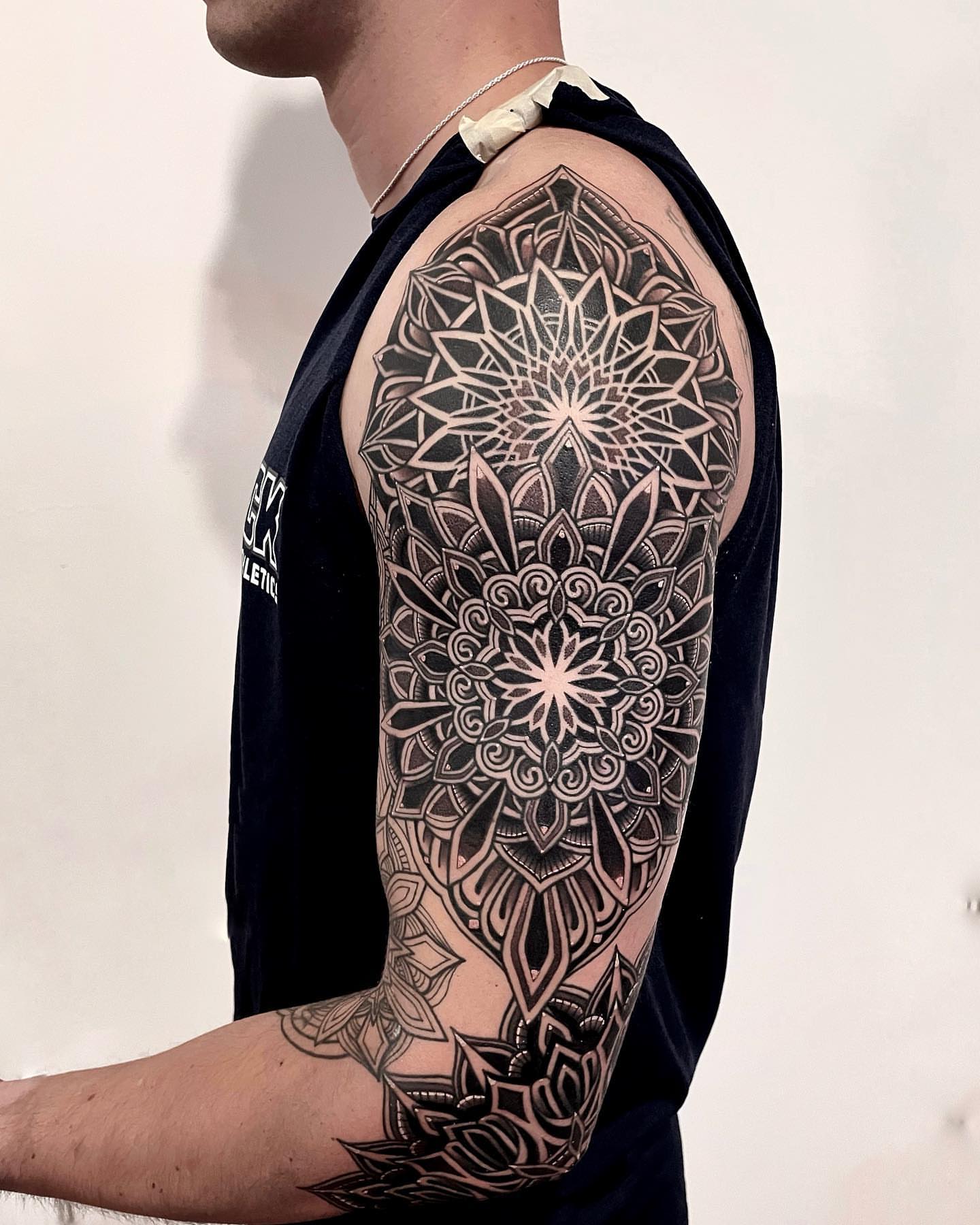 Mandala geometric tattoo on the upper arm by LA tattoo