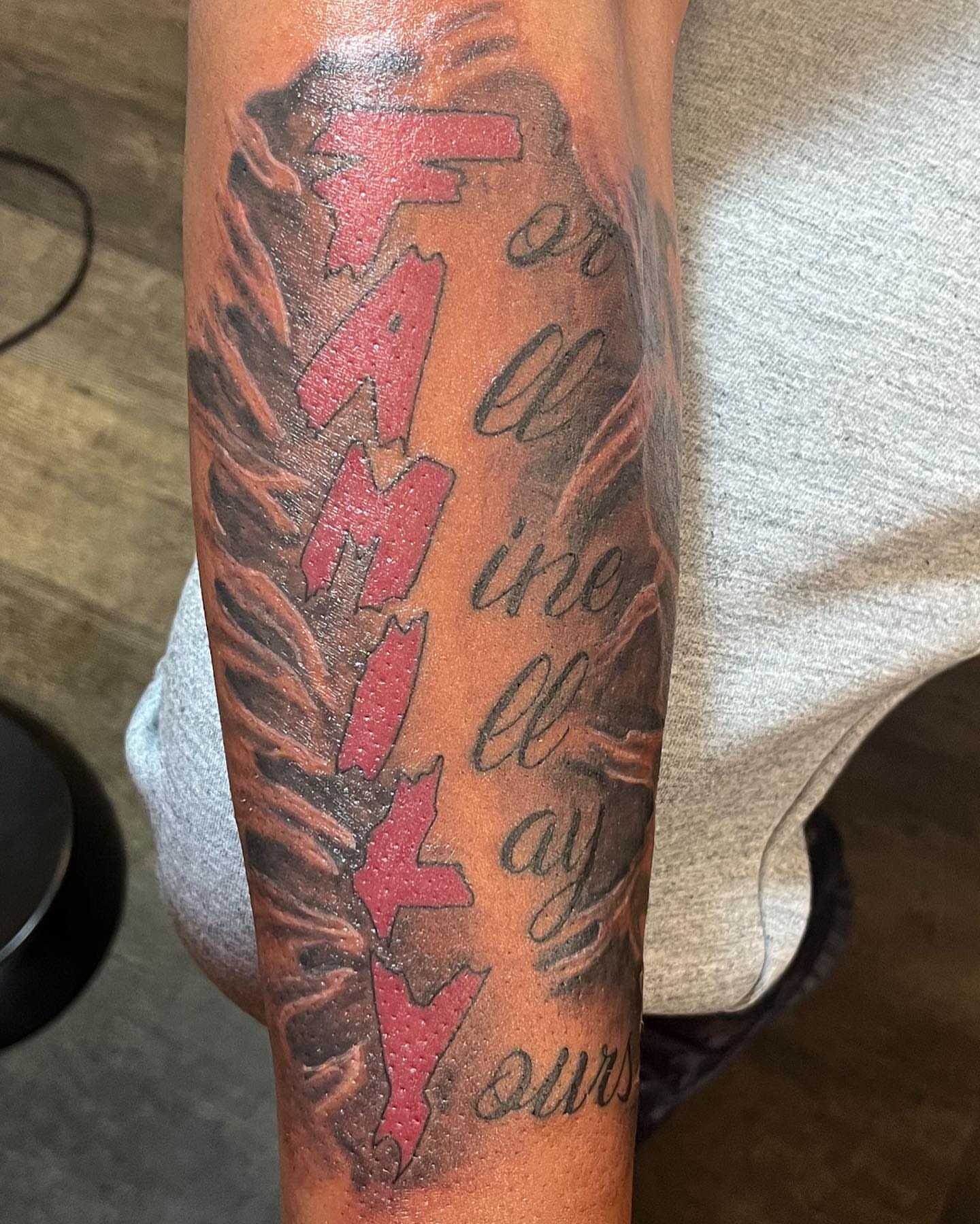 Family lettering script tattoo on the forearm by Breanna💉🔮, Dover, Delaware