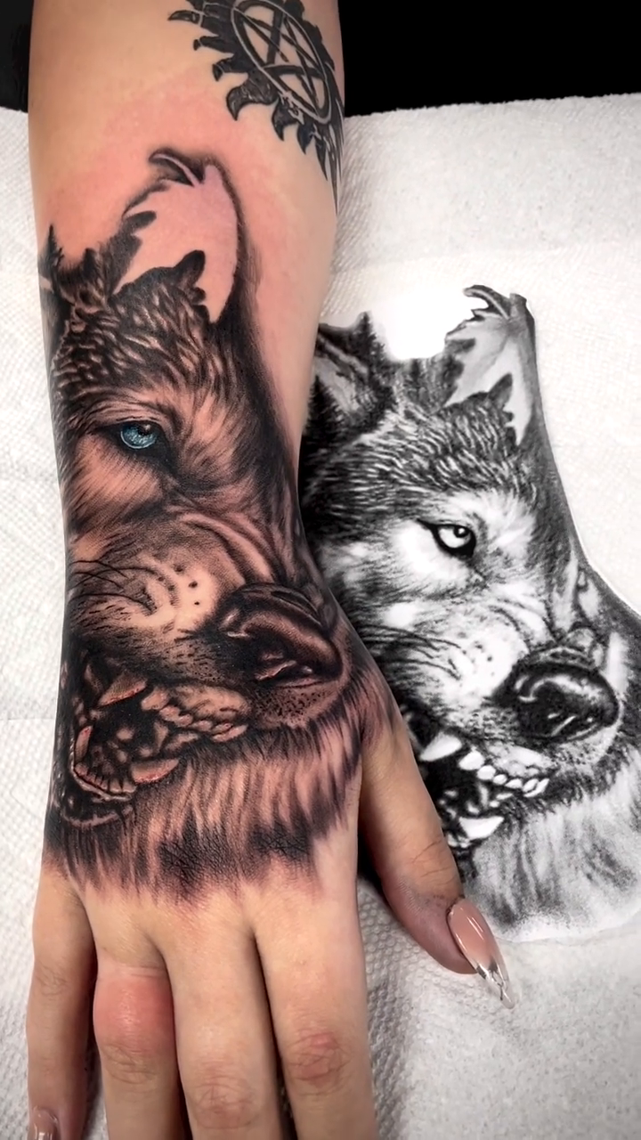 Two wolves realism tattoo by Charlie