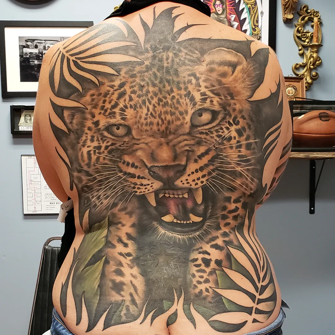 Leopard realism tattoo on the back by Don Taylor
