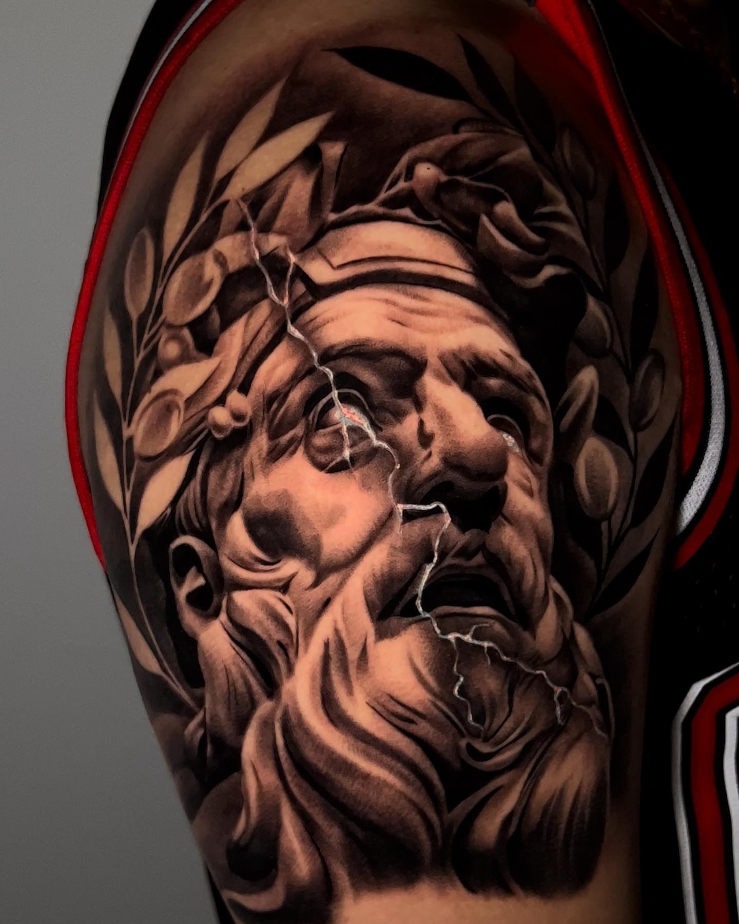 God-like figure realism tattoo on the forearm by Ivan Guadalupe guzman