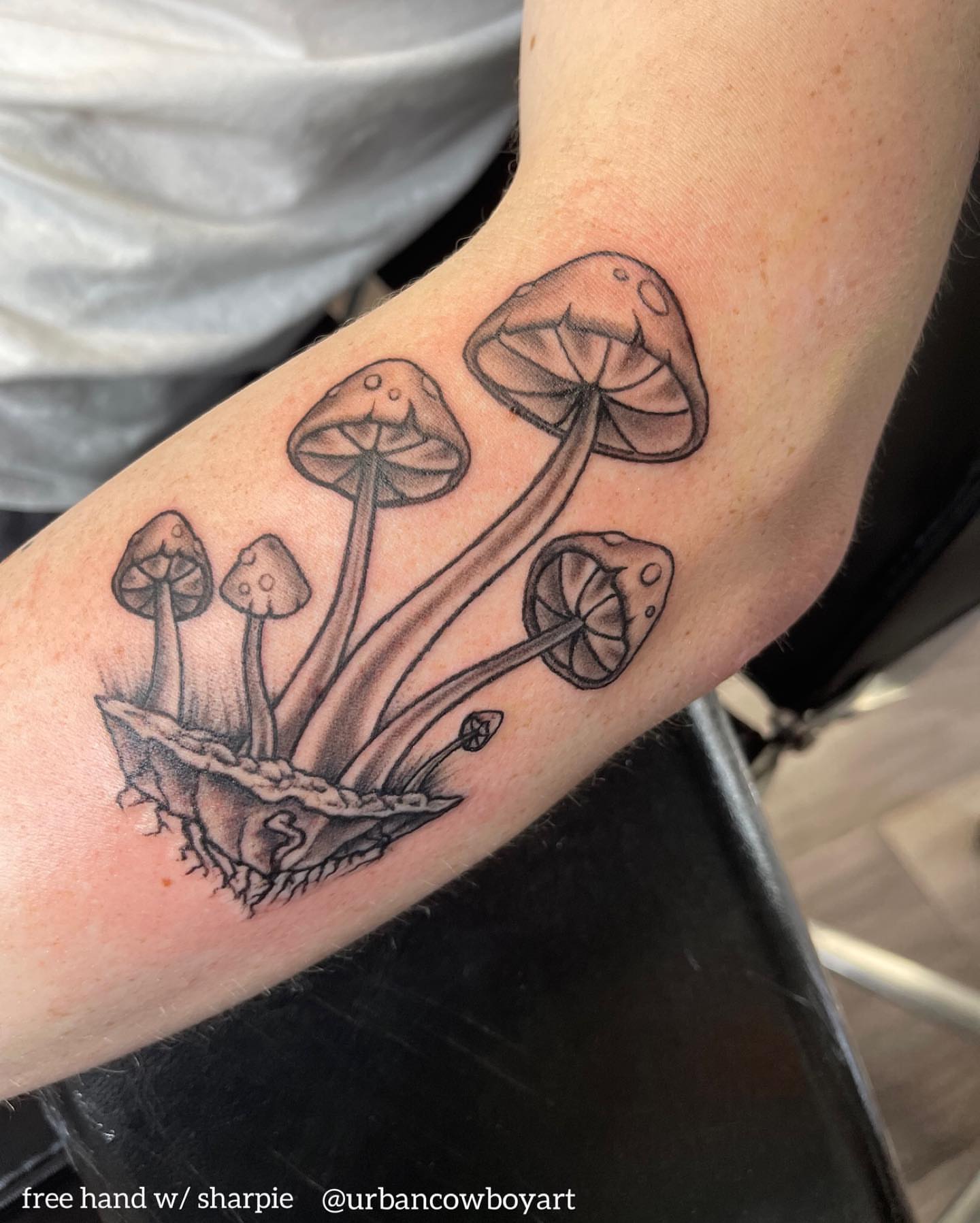 Mushroom cluster black and grey tattoo on the forearm by Ohio Realism Tattoo Artist
