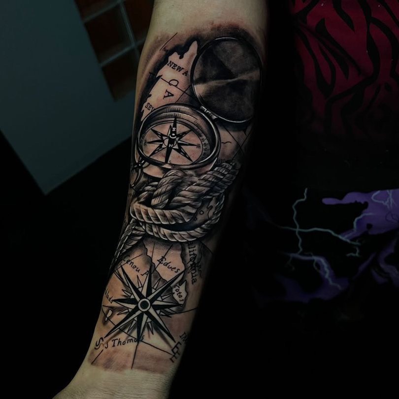 Compass and rope realism tattoo on the forearm by Christopher McGlone