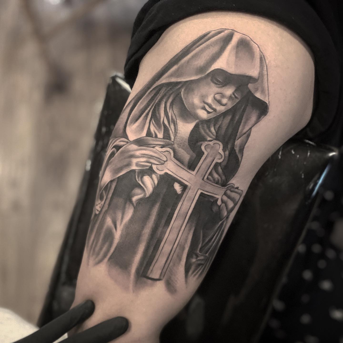 Religious figure with cross realism tattoo on the forearm by ⠀⠀ ⠀ ⠀ ⠀⠀ ⠀⠀ ⠀⠀ ⠀ ⠀⠀ ⠀⠀ᎪᎳᏃ, West Hollywood, California
