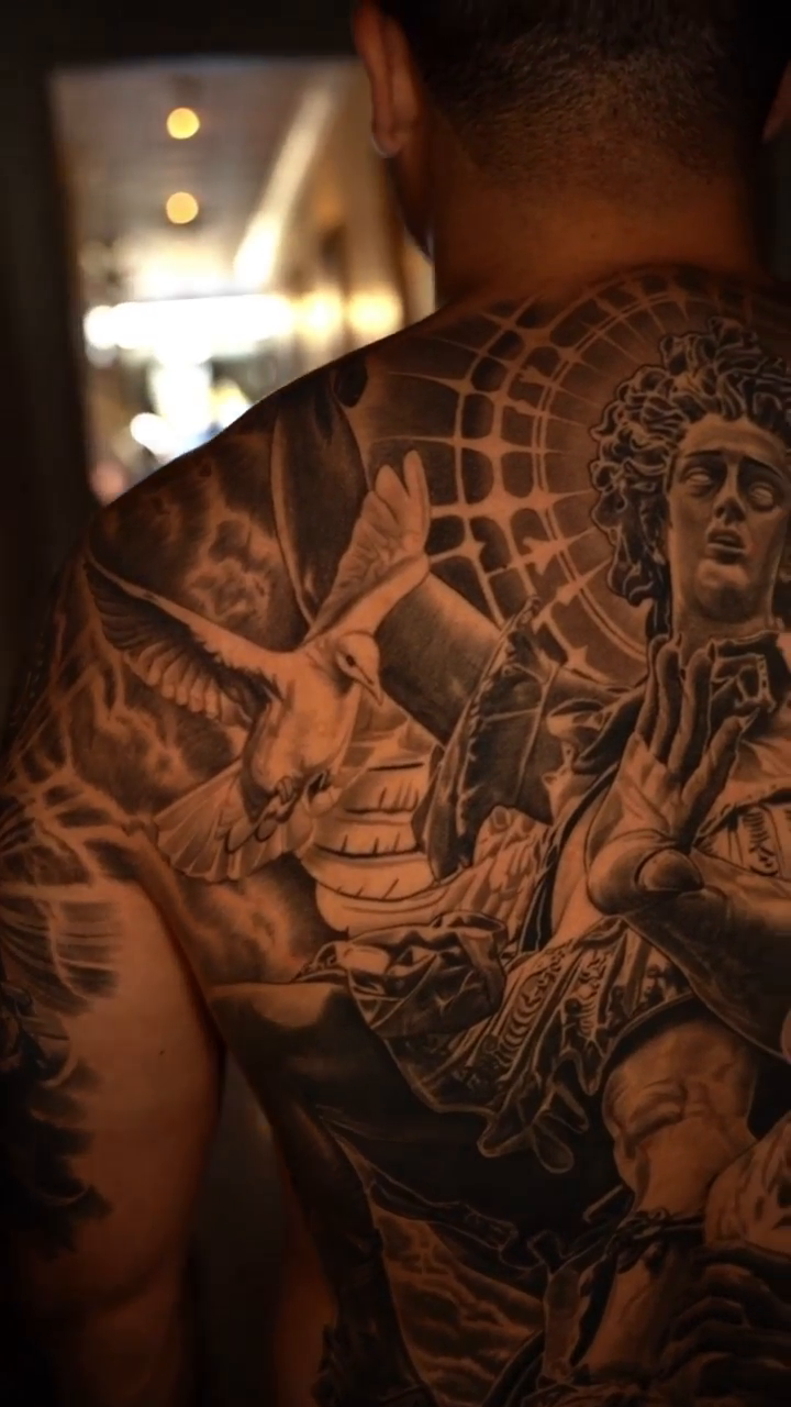 Archangel Michael battling a demon realism tattoo by Alan Delarosa