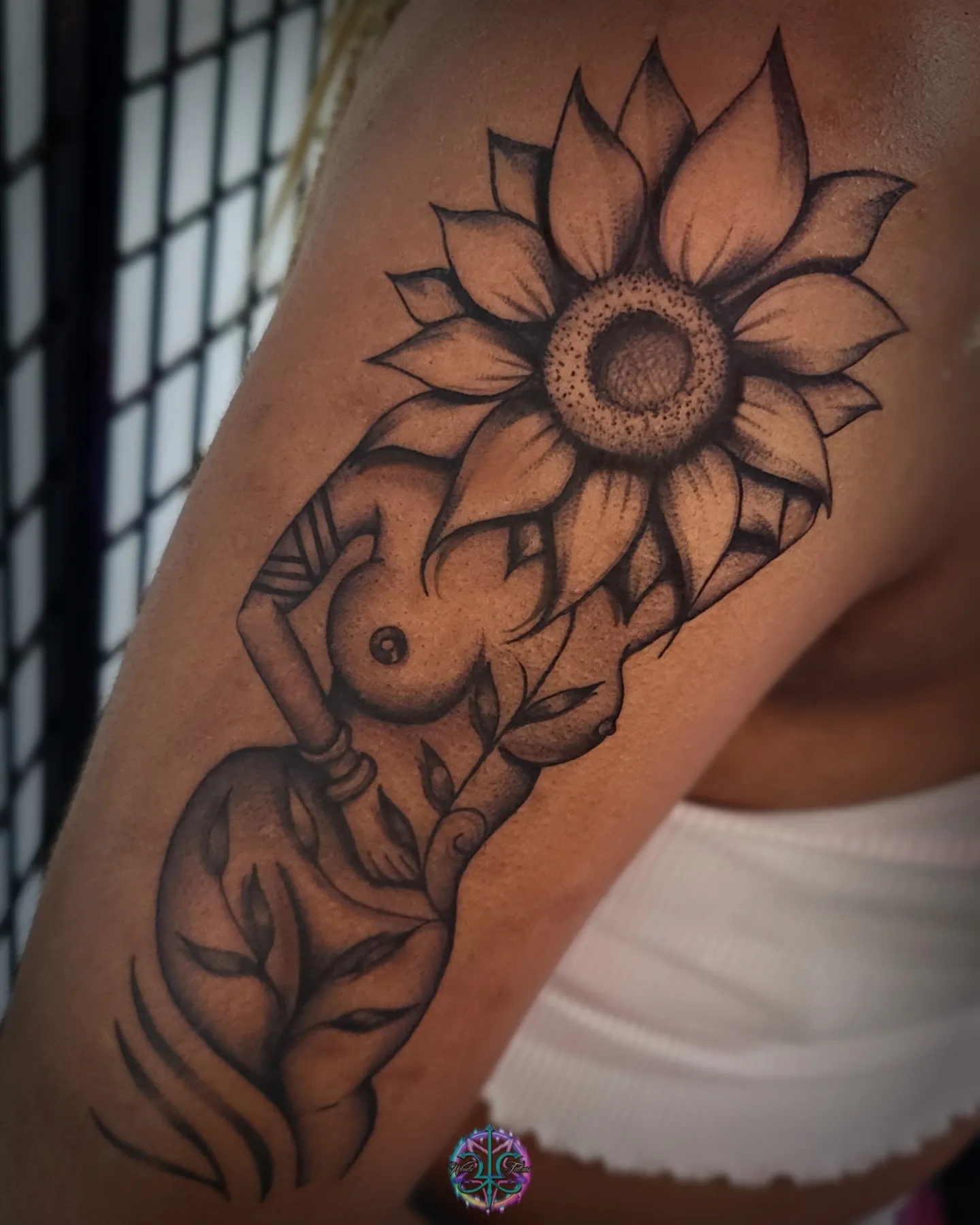 Sunflower black and grey tattoo on the shoulder by Wendii Calderon