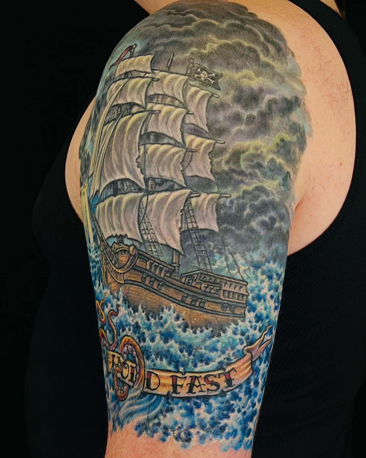 Ship sailing through storm realism tattoo on the upper arm by James Kern * Visionary Tattoo Artist *