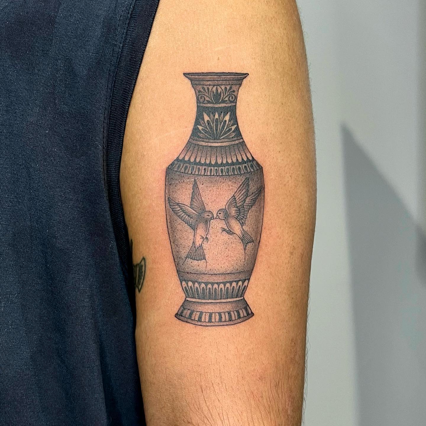 Vase with birds black and grey tattoo on the forearm by hiba ⊹ atlanta tattoo artist, Johns Creek, Georgia