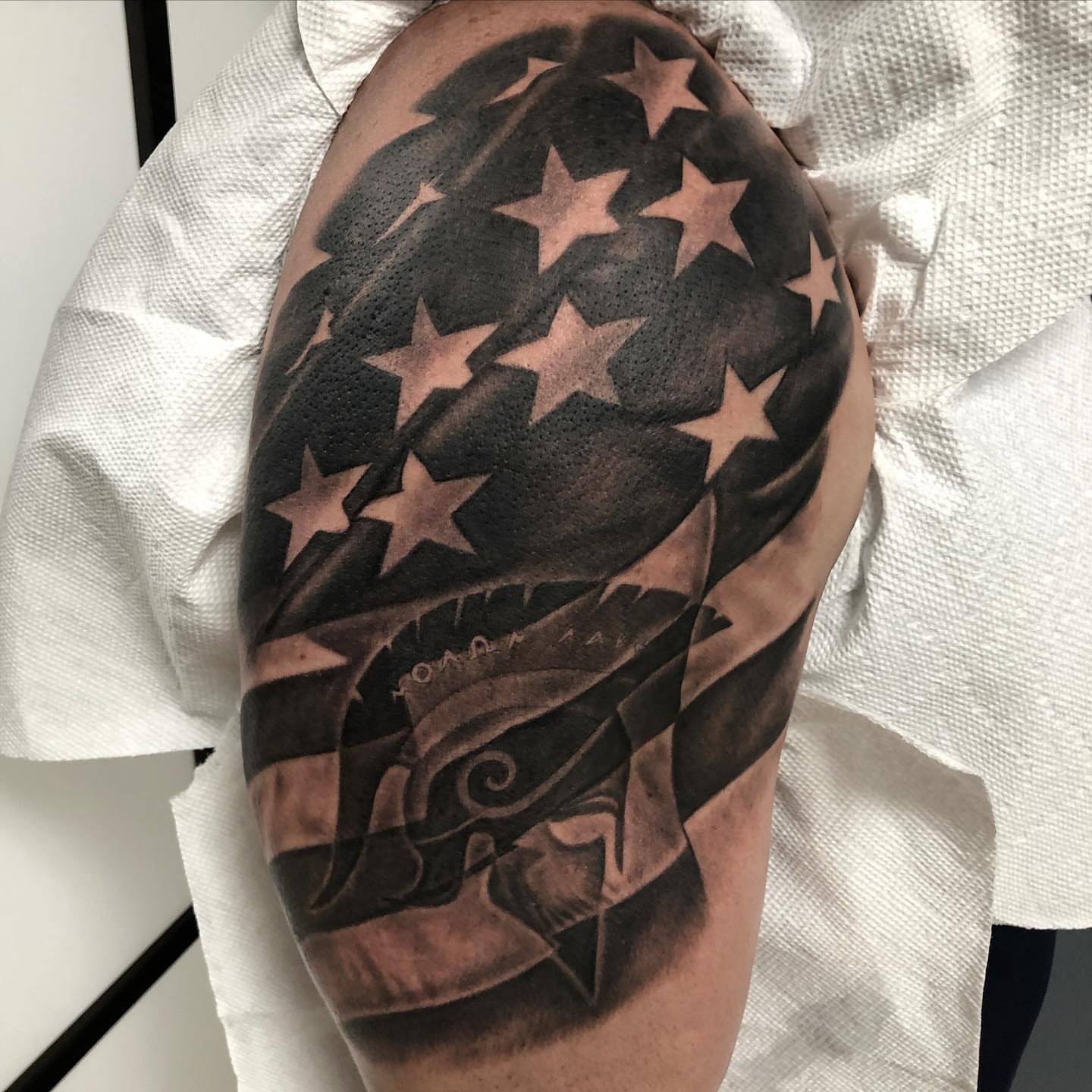 American flag American traditional tattoo on the shoulder by Gary Graves